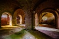 Vaulted red brick dungeon under old mansion Royalty Free Stock Photo