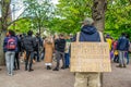 VAUXHALL, LONDON, ENGLAND- 1 May 2021: Protester wearing an anti-police and anti-government sign at a KILL THE BILL protest