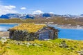 Vavatn lake panorama landscape cottages huts snowy mountains Hemsedal Norway Royalty Free Stock Photo