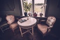 Vaxjo, Seden - October, 2018: Vintage furniture, decor inside classic Bergkvara Tantens cafe, beautifully situated in a cultural