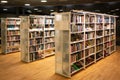 Vaxjo, Sweden - March, 2019: Colorful wall of books on the shelfs at the rotunda in Vaxjo Public Library