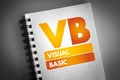 VB - Visual Basic acronym on notepad, technology concept background