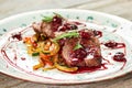 Veal with grilled vegetables and sauce. Royalty Free Stock Photo