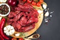 Veal meat for cooking stew, azu or other meat main dish. Chopped raw beef or lamb meat with seasonings Royalty Free Stock Photo