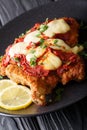 Veal Milanesa Napolitana with mozzarella cheese and tomato sauce