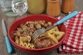 Traditional French meal with homemade meat and pasta served on a plate close-up Royalty Free Stock Photo