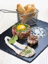 Veal tartar prepared with herb croutons. Beef raw Royalty Free Stock Photo