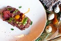 Veal tartar with quail eggs Royalty Free Stock Photo