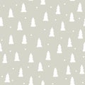 Vector abstract christmas tree seamless pattern. Hand drawn white simple tree symbol and snowflakes isolated on grey background. Royalty Free Stock Photo