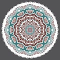 Vector abstract floral twelve-pointed mandala on a grey background.