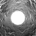 Vector abstract glowing point noise background. Array of glowing points in form of distorted surface. Royalty Free Stock Photo