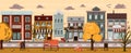Vector autumn street with houses, cafes, bookstore, bakery, school, coffee shop. Flat illustration of the city in the