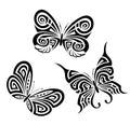 Background with the image set of black and white butterflies in the form of a tribal tattoo Royalty Free Stock Photo