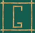 Capital letter G made of realistic brown dry bamboo poles inside of wooden stick frame