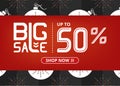 Vector banner with lettering big sale up to fifty percent shop now and Christmas ball with ornamental snowflake and grey stripes