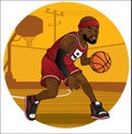 Basketball player dribbling the ball Royalty Free Stock Photo
