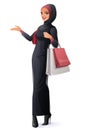 Vector beautiful Muslim woman in hijab standing with shopping bags. Royalty Free Stock Photo