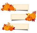 Vector beige banners with orange pumpkins and autumn leaves. Royalty Free Stock Photo