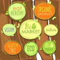 Vector Bio icon set on a wooden fence of labels, stamps or stickers with signs - Bio market, gluten free, organic product, vegan,