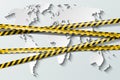 Vector biohazard danger yellow black tape on white paper cut world map background. Safety fencing ribbon. World quarantine flu. Royalty Free Stock Photo