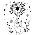 Vector black and white sketch of a witch`s hand and a shooting star