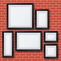 Vector blank picture frame set on brick wall Royalty Free Stock Photo