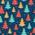 Vector blue, red, and yellow scattered christmas trees winter holiday seamless pattern on dark blue background. Great Royalty Free Stock Photo