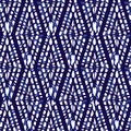 Vector blue shibori monochrome vertical diamonds zig zag seamless pattern. Suitable for textile, gift wrap and wallpaper Royalty Free Stock Photo