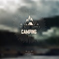 Vector blurred landscape background with summer camping badge