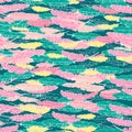 Vector boho hand drawn doodle seamless pattern with yellow, pink feathers on green background. Royalty Free Stock Photo