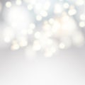 Vector bokeh background. Festive defocused white lights.