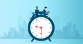 Vector of a business man and businesswoman using laptop sitting on a clock working long hours