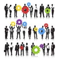 Vector of Business People Holding Gears Royalty Free Stock Photo