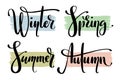 Vector calligraphic set. Parts of the year. Names of seasons by hand. Winter, Spring, Summer and Autumn words on brush