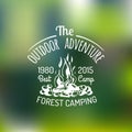 Vector camping logo on blurred background. Hand drawn tourist poster or card. Hipster emblem of outdoor adventures.