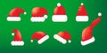 vector cartoon 3d christmas Santa Claus red hat icons set isolated on green background. Merry christmas santa hat symbol Royalty Free Stock Photo