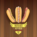 Vector cartoon hotdogs label isolated on wooden table background. Royalty Free Stock Photo