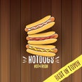 Vector cartoon hotdogs label isolated on wooden table background. Vintage hot dog poster or icon design element Royalty Free Stock Photo