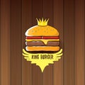 Vector cartoon royal king burger with cheese and golden crown icon isolated on on wooden table background. Royalty Free Stock Photo