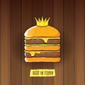 Vector cartoon royal king burger with cheese and golden crown icon isolated on on wooden table background.