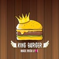 Vector cartoon royal king burger with cheese and golden crown icon on on wooden table background.