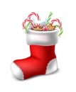 Cartoon style Christmas red sock with candies inside. Isolated on white background Royalty Free Stock Photo