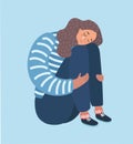 Sad girl sitting and unhappily hugging her knees. Royalty Free Stock Photo