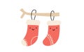 Vector christmas illustration couple of warm knitted happy smilling red socks. Pair of cute patterned elements for
