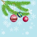 Vector Christmas or New Year background poster with fir-tree branches and hanging chrismas balls on blue with white snowflakes Royalty Free Stock Photo