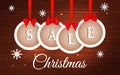 Vector Christmas sale banner with white round frames, red bows and snowflakes on dark brown wooden background Royalty Free Stock Photo