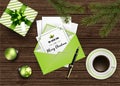 Vector Christmas holiday top view background with greeting card in envelope