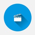 Vector clapper for movie on blue background. Flat image with long shadow