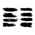 Vector collection of artistic grungy black paint hand made creative brush stroke set isolated on white background. A group of Royalty Free Stock Photo