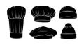 Vector collection of chef hats and winter knit caps in black silhouette style Royalty Free Stock Photo